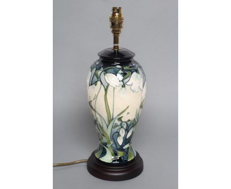 A MOORCROFT POTTERY SNOWDROP PATTERN ELECTRIC TABLE LAMP BASE, modern, of inverted baluster form, tubelined and painted in co
