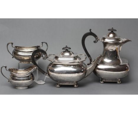 A SILVER TEAPOT AND COFFEE POT, maker CS & S, Sheffield 1924, of rounded oblong baluster form upon four bun feet, with flat h