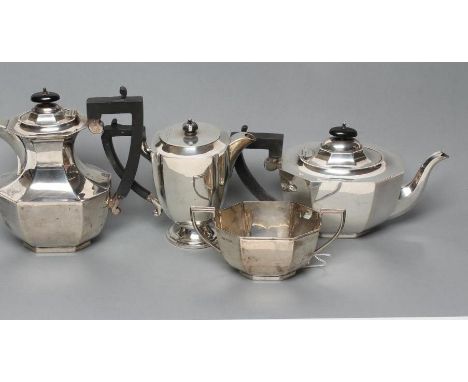 A SILVER THREE PIECE TEA SERVICE, maker Viners, Sheffield 1932, of canted oblong form, comprising teapot and coffee pot, the 