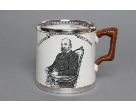 OF LOCAL LEEDS INTEREST - an Edwardian silver mounted earthenware mug of plain cylindrical form with cane bound angular handl