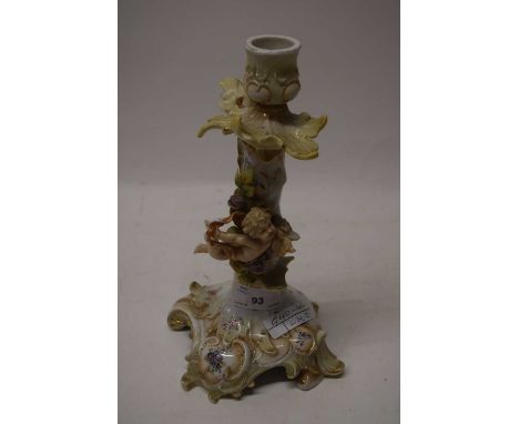 Continental porcelain candlestick with cherub decoration