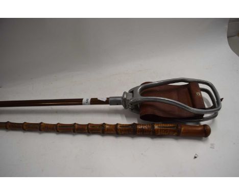 A shooting stick and a bamboo walking cane