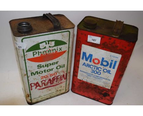 Two vintage motor oil cans