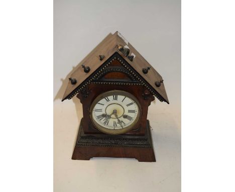 Late 19th Century mantel clock in an architectural metal mounted case