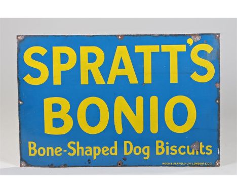 Spratt's Bonio enamel sign, yellow text Spratt's Bonio Bone-Shaped Dog Biscuits on a blue ground 76cm x 51cm