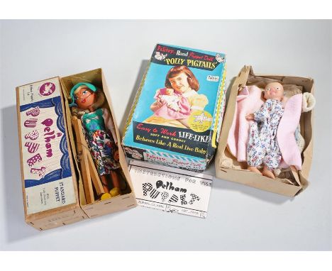 Pelham Puppet, Standard puppet, together with Polly Pigtails, both boxed, (2)