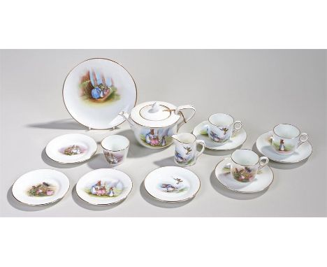 Grimwades Peter Rabbit porcelain nursery tea service, with a teapot three cups and saucers, milk jug, bowl four smaller plate