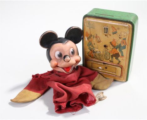 Tin plate money box, together with a Mickey Mouse hand puppet, (2)