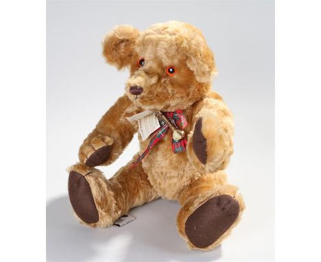 Madrigal Designs bear, Royce Bear, with orange eyes and tartan scarf with key, 46cm long