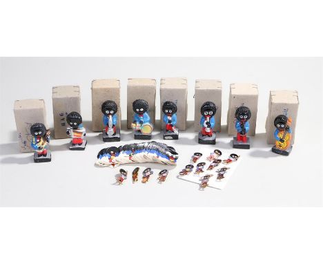 Robertson Golly figures, eight boxed examples, together with Golly enamel badges and quantity of stickers, (qty)