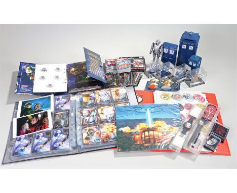 Doctor Who, to include a Tardis money box, a figure, Battles in Time cards, together with signed cards, key ring, also togeth