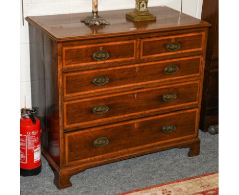 A George III mahogany four height straight front chest of drawers, cross banded in box wood, raised on bracket supports, 93cm