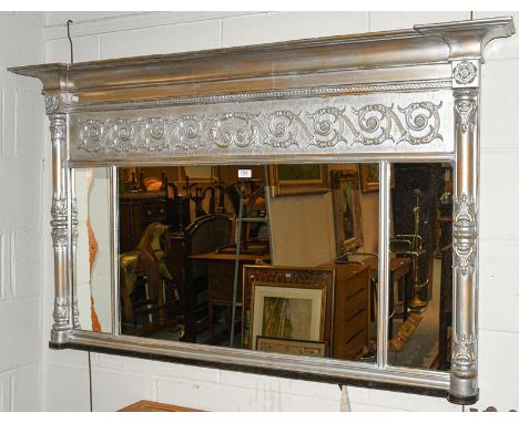 A Regency triptych over-mantel mirror, later silvered, of architectural form, foliate scrollwork frieze on column supports