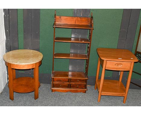 An Ercol blonde oak lamp table, a Goodwill furmica top table and a mahogany fret carved open shelf-front (3)