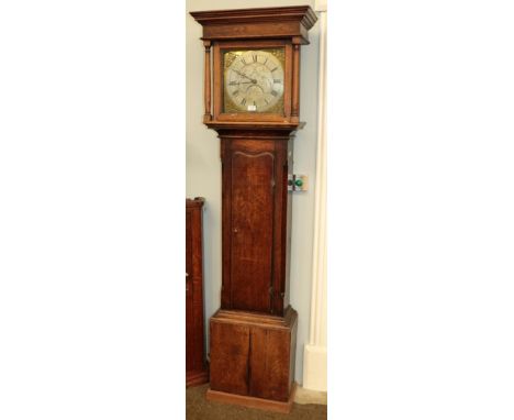 An oak thirty hour longcase clock, square brass dial inscribed E. Foster Carlisle, later movement