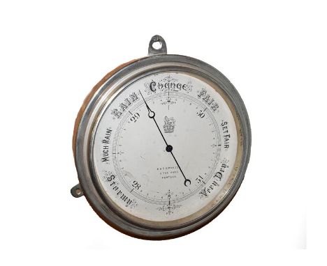 A silvered brass case aneroid barometer, 10'' silvered dial signed E &amp; E. Emanuel, 3 The Hard, Portsea, circa. 1890, 31cm