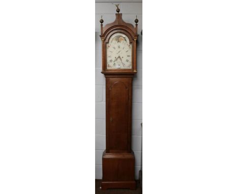 An oak eight day longcase clock, 12'' arch painted dial signed Cox, Devizes, the arch with moonphase aperture, inscribed abov