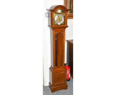 An early 20th century mahogany chiming small longcase clock