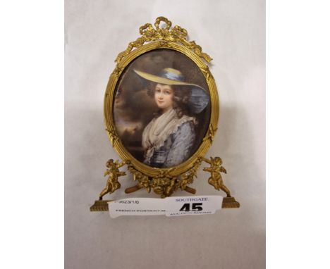 FRENCH PORTRAIT MINIATURE OF A LADY - IN BRASS FRAME - 14.5 CMS (H) APPROX