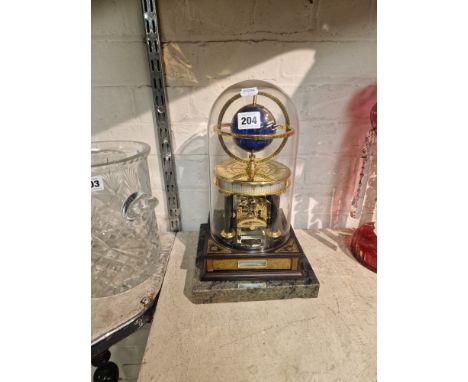 ROYAL GEOGRAPHICAL SOCIETY MILLENIUM CLOCK IN GOOD WORKING ORDER (KEY IN DRAWER)