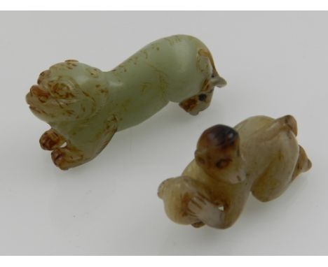 Two miniature jade carving of a dog of Foo and a monkey. Largest L: 5.5cm 