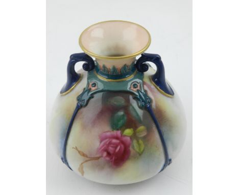 A Worcester vase, of squat panelled form, decorated with roses. H: 9cm. 