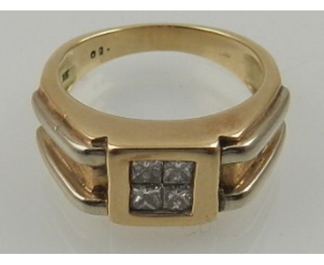 A yellow metal and diamond ring, set four princess cut stones of approx. 0.50 carats combined, the shank stamped 9K. 
