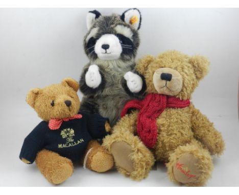 A Steiff child's stuffed toy modeled as a racoon, H. 33cm, together with a Hamley's Teddy and another, (3).  
