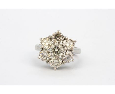 An 18ct white gold brilliant cut diamond set cluster ring, approx. 2.5ct overall, (H.5).