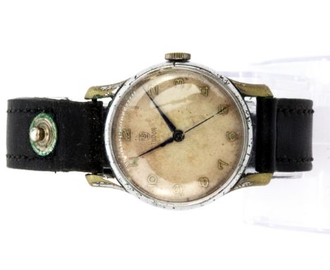 A gentleman's vintage Tudor wrist watch on a leather strap.