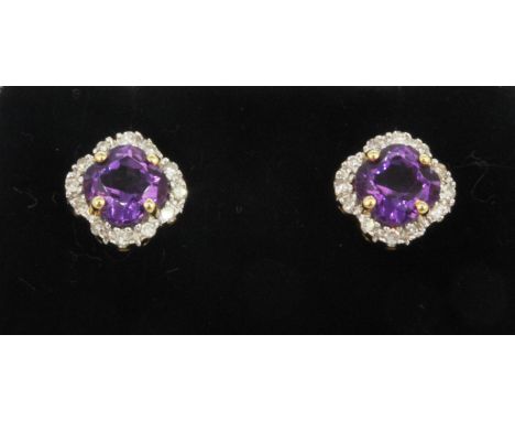 A pair of 18ct yellow gold stud earrings set with amethyst and diamonds, L. 0.6cm.
