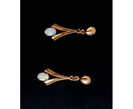 A pair of 9ct yellow gold opal set drop earrings, L. 2.7cm.