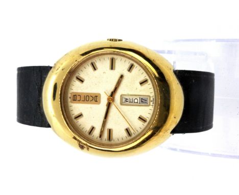 A gentleman's vintage gilt Bulova wrist watch on a leather strap.