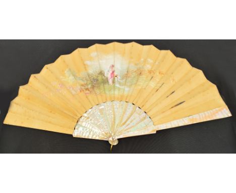 A late 19th century French folding fan with plain mother of pearl guards and sticks, the rivet set with a clear paste, and su
