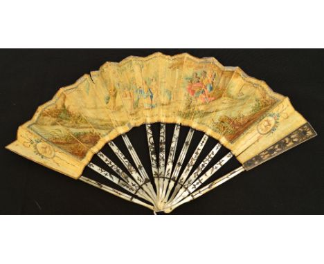 A late 18th century folding fan with pierced and silver inlaid mother of pearl guards, and silver inlaid sticks, the leaf han
