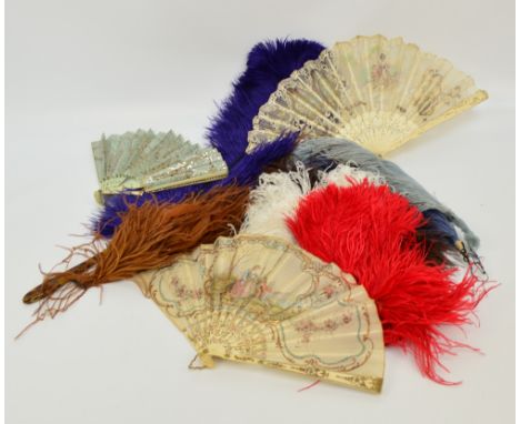 An early 19th century French folding fan with shaped, carved and pierced bone guards set with studs, with matching sticks, wi