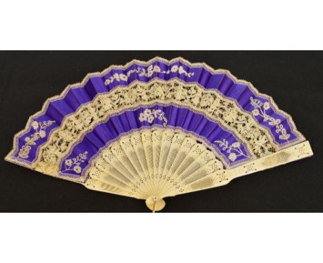 A Victorian folding fan of faux cabriolet form with carved pierced bone guards and composite sticks, with mother of pearl edg