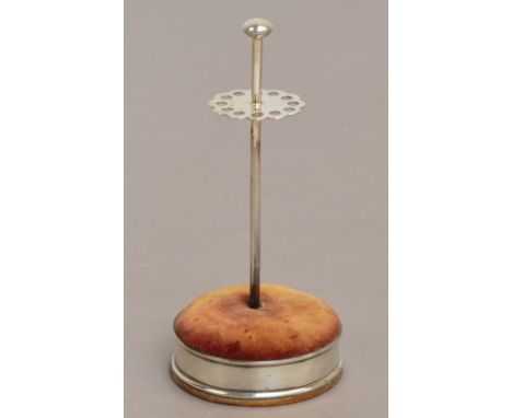 An Edward VII hallmarked silver hat pin stand of plain design with a knob top, with a pierced platform to support hat pins, a