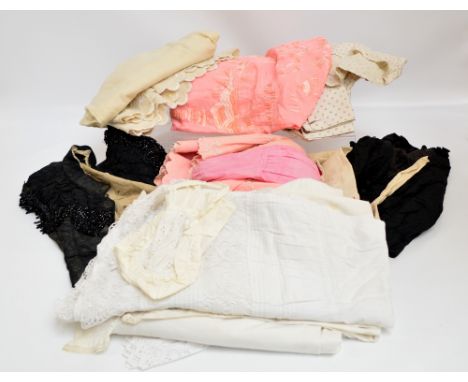 A quantity of vintage clothing including two black silk bodices, one decorated with beading, an early 20th century cream with
