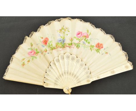 A Liberty & Co Ltd folding fan, the pierced and carved bone guards and sticks forming a fontange shape with mother of pearl e