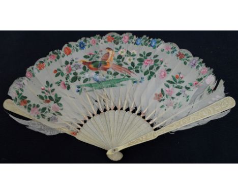 A late 19th century Chinese feather folding fan with carved bone guards and sticks, with mother of pearl edged rivet and the 