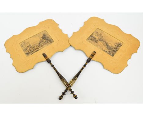 A pair of late 19th century European screen fans with ebonised wooden sticks, chinoiserie decorated, holding embossed paper s