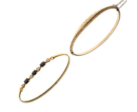 9ct gold snap bangle, together with an unmarked yellow metal bangle set three faceted oval sapphires, 9.5g gross approx  