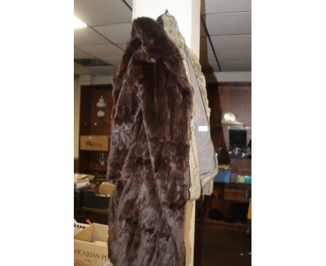 A LADIES FUR COAT 'M. MICHAELS FURS OF BRISTOL' TOGETHER WITH A FUR JACKET 'SHERWINS, BLACKPOOL'  (2)