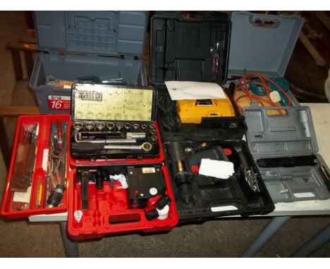A QUANTITY OF CASED TOOLS AND A SOCKET SET