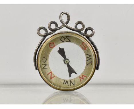 A Silver Mounted Miniature Charm Compass, 2cms Diameter