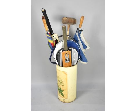 A Collection of Various Tennis Rackets and Cricket Bats, Croquet Mallets Etc in Circular Stick Stand