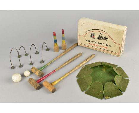 A Vintage Table Croquet Game together with Captive Golf Ball in Original Box and Practice Putting Hole with Hinged Sides