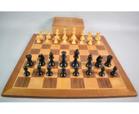 A Wooden 45cms Square Chessboard together with a Set of Modern Staunton Style Chess Pieces, Kings 8cms High