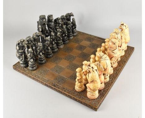 A Modern Moulded Chessboard and Chess Set